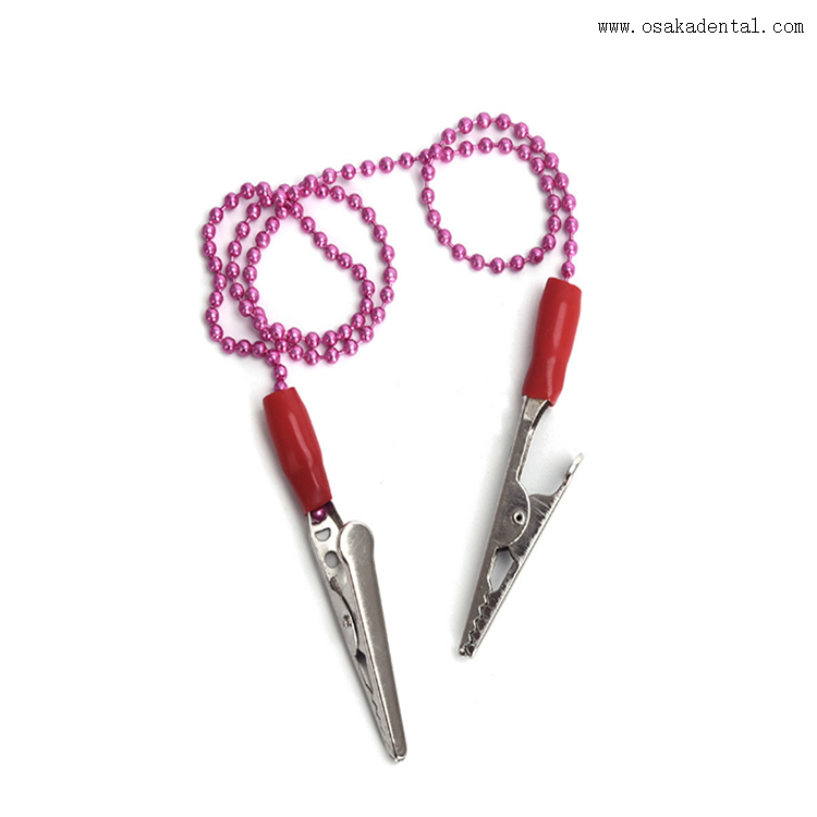 حامل مرايل الأسنان بمشبك بلاستيكي أو معدني