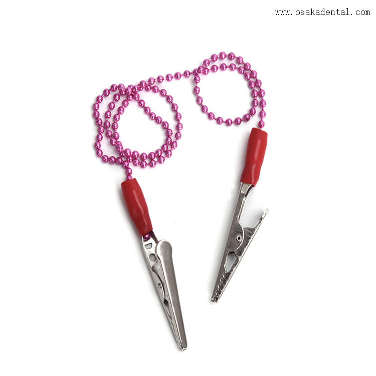 حامل مرايل الأسنان بمشبك بلاستيكي أو معدني