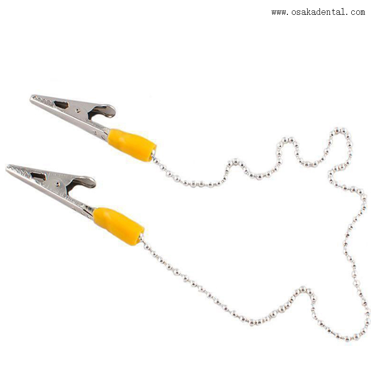 حامل مرايل الأسنان بمشبك بلاستيكي أو معدني